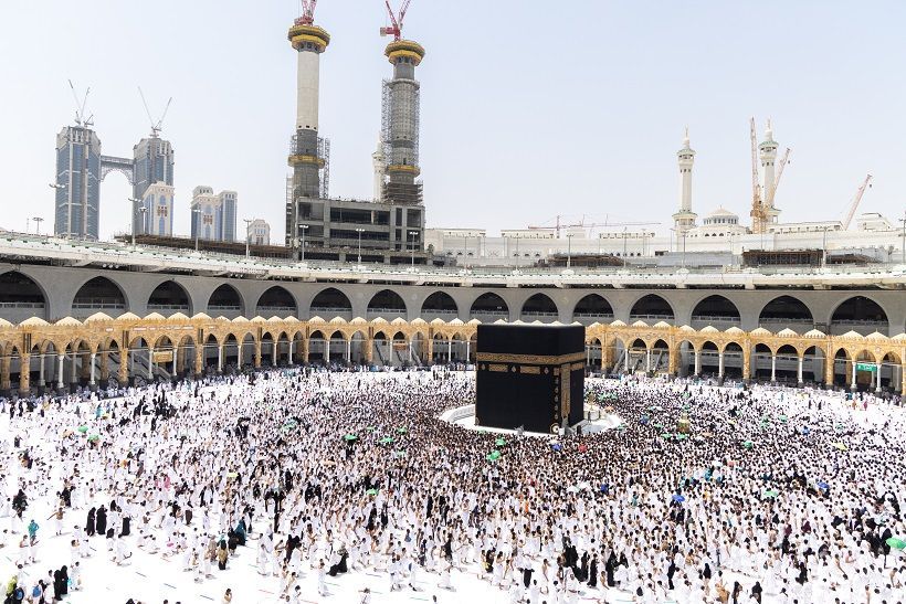 An aerieal view of the Prophet's mosque with its umbrellas, minarets and the Green Dome showing